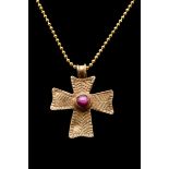 BYZANTINE GOLD CROSS WITH STONE