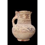 ISLAMIC POTTERY JUG WITH TWISTED HANDLE