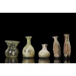 COLLECTION OF FIVE ROMAN GLASS FLASKS