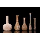 COLLECTION OF FIVE ROMAN GLASS BOTTLES