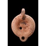 ROMAN TERRACOTTA OIL LAMP WITH ANIMAL