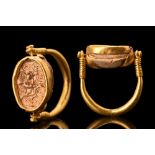EGYPTIAN GOLD SWIVEL RING WITH SCARAB