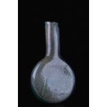 ANCIENT ROMAN GLASS AMPULLA