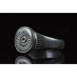 ROMAN BRONZE RING WITH SUN SYMBOL