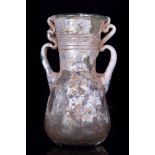 ROMAN GLASS FLASK WITH TRAILED HANDLES