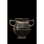 GNATHIAN BLACK-GLAZED TWO HANDLED CUP