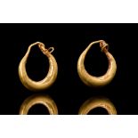 A PAIR OF HELLENISTIC GOLD BOAT-SHAPED EARRINGS