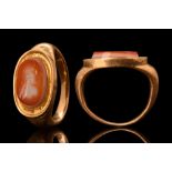 ROMAN GOLD INTAGLIO RING WITH ASCLEPIUS