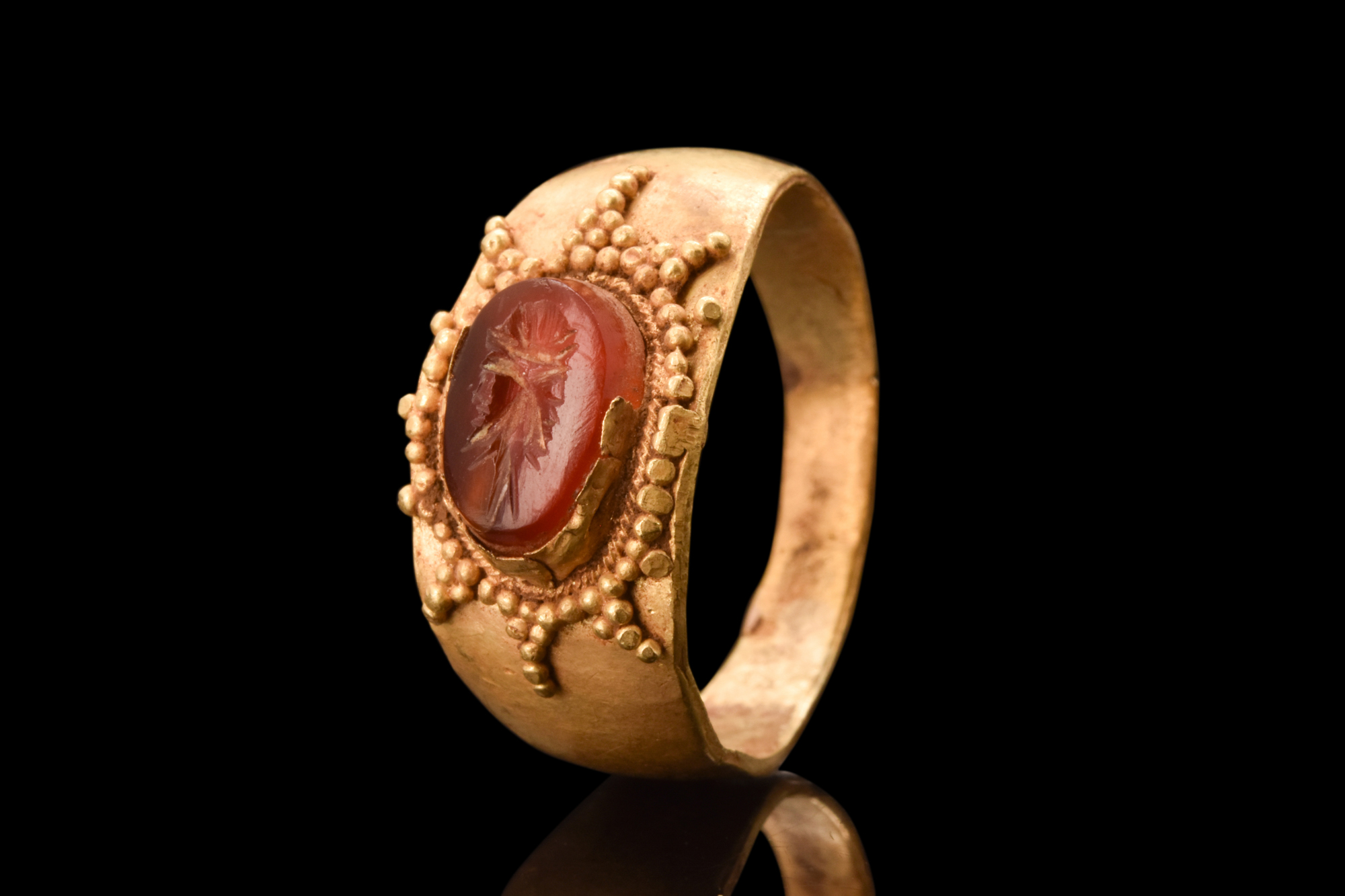 ROMAN CARNELIAN JANUS INTAGLIO IN GOLD RING