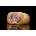 ROMAN GOLD RING WITH INTAGLIO SCENE - CUPID, GOAT AND HERCULES
