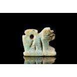 EGYPTIAN FAIENCE RECUMBENT LION AMULET