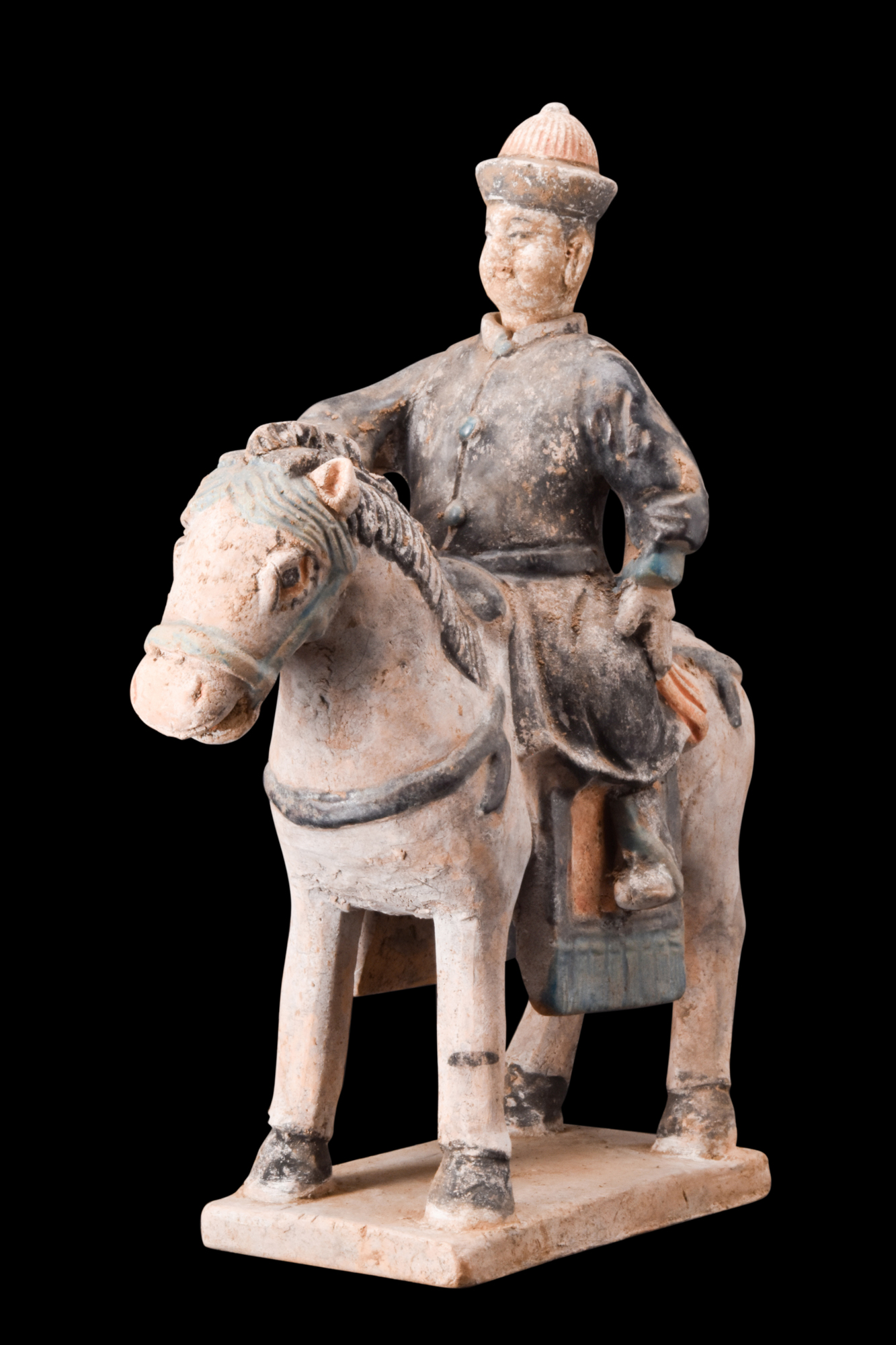CHINESE MING DYNASTY GLAZED TERRACOTTA RIDER ON A HORSE