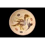 NISHAPUR POTTERY GLAZED BOWL WITH A BIRD