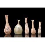 COLLECTION OF FIVE ROMAN GLASS BOTTLES