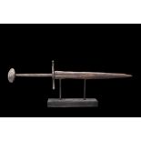 MEDIEVAL IRON DAGGER WITH DISC-SHAPED POMMEL