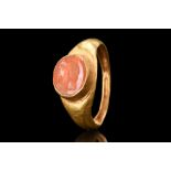 ROMAN GOLD RING WITH CARNELIAN JUPITER PORTRAIT INTAGLIO