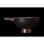 APULIAN BLACK GLAZE CUP WITH HANDLE