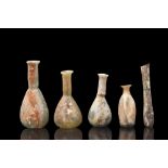 COLLECTION OF FIVE ROMAN GLASS BOTTLES