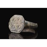 ROMAN BRONZE RING WITH SUN SYMBOLS