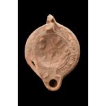 ROMAN BEIGE TERRACOTTA OIL LAMP WITH THREE PUTTI