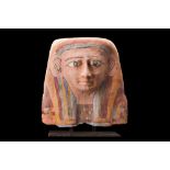 EGYPTIAN FACE FROM A WOODEN COFFIN LID