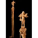 AN EASTERN ROMAN GOLDEN PIN WITH WINGED EROS