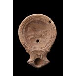 ROMAN BEIGE TERRACOTTA OIL LAMP WITH A HORSE