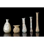 COLLECTION OF FIVE ROMAN GLASS BOTTLES