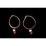 MATCHED PAIR OF ROMAN GOLD EARRINGS