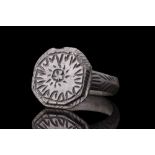 ROMAN BRONZE RING WITH SUN SYMBOL