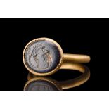 ROMAN INTAGLIO WITH BUCOLIC SCENE IN A GOLD RING