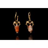 MATCHED PAIR OF GREEK HELLENISTIC GOLD EARRINGS WITH DOLPHINS