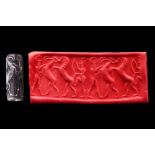 MESILIM PERIOD / DYNASTIC III (MESOPOTAMIA) BLACK STONE CYLINDER SEAL