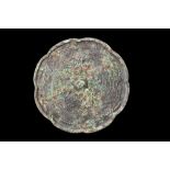 CHINESE TANG DYNASTY BRONZE MIRROR WITH FLORAL MOTIFS