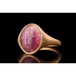 ROMAN AMETHYST INTAGLIO WITH MERCURY IN A GOLD RING