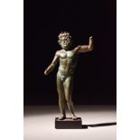 A BRONZE STATUETTE OF JUPITER DEPICTING ZEUS BRONTAIOS