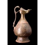 SELJUK BRONZE EWER WITH LAMP-SHAPED SPOUT