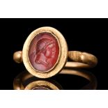 ROMAN GOLD RING WITH CARNELIAN PORTRAIT INTAGLIO