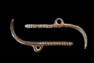 BRONZE AGE BRONZE CLAW-SHAPED AMULETS
