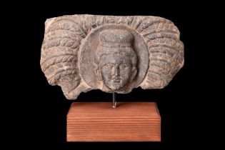 GANDHARA SCHIST PANEL WITH HEAD OF BUDDHA