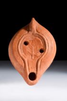 ROMAN TERRACOTTA OIL LAMP WITH LEAF