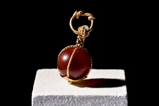 VIKING AGE CARNELIAN BEAD IN GOLD PENDANT