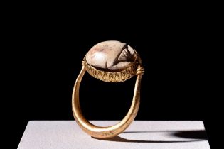 SWIVEL GOLD RING WITH EGYPTIAN SCARAB