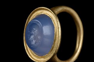 HELLENISTIC SAPPHIRE INTAGLIO WITH ATHENA IN A HEAVY GOLD RING
