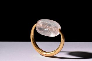 PHOENICIAN GOLD SWIVEL RING WITH GRIFFIN SCARABOID ROCK CRYSTAL