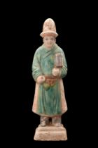 CHINESE MING DYNASTY GLAZED TERRACOTTA ATTENDANT