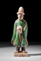 CHINESE MING DYNASTY GLAZED TERRACOTTA ATTENDANT