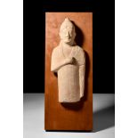 CYPRIOT LIMESTONE VOTIVE FIGURE