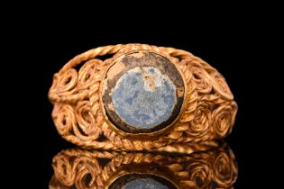 LATE ROMAN GOLD AND GLASS RING - EX CHRISTIE'S