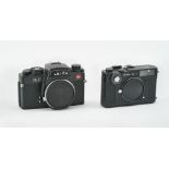 Zwei Leica Fotokameras